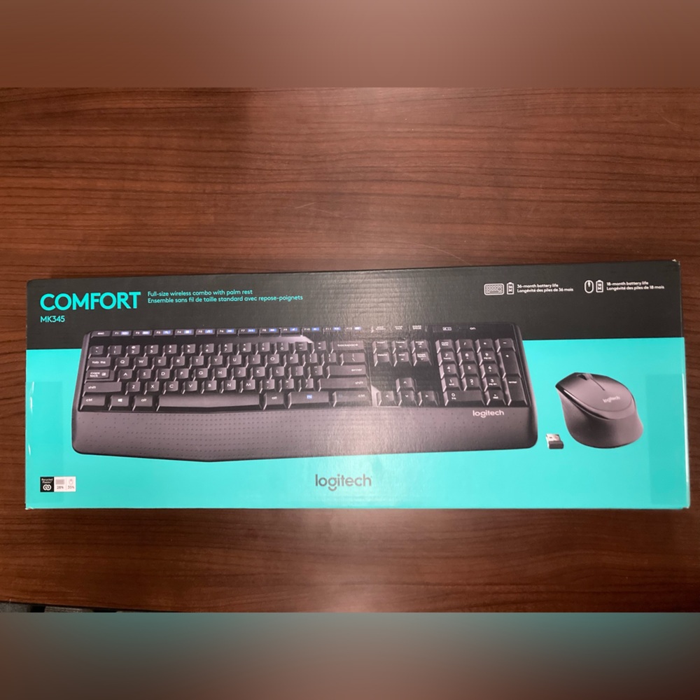 Brand new, never opened Logitech Wireless MK345 mouse/keyboard.
